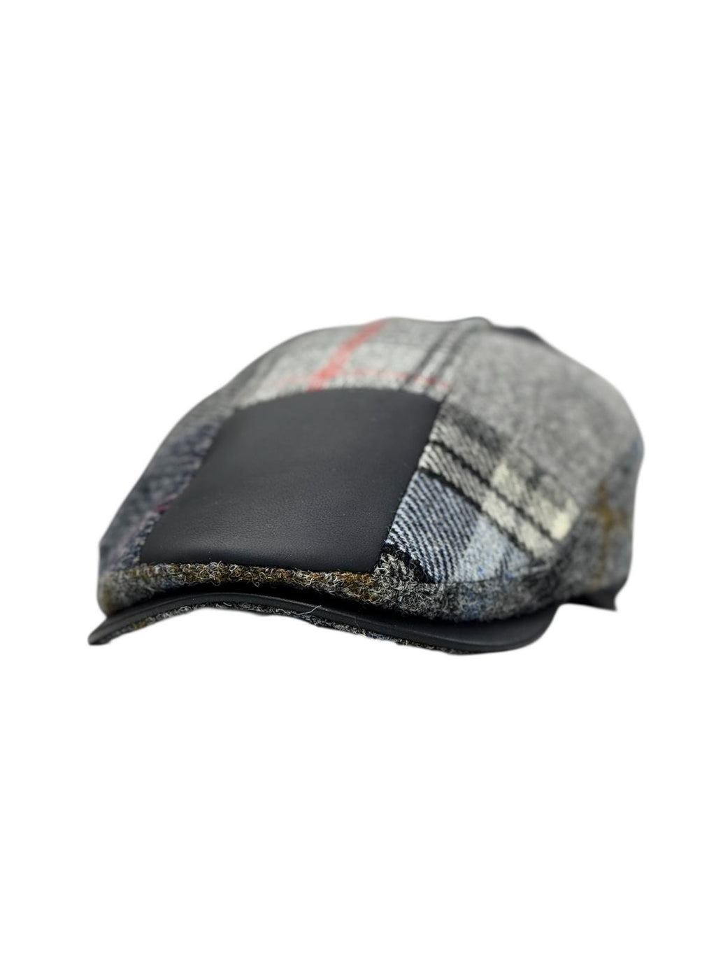 Modello London Conte in tessuto shetland patchwork con fascetta e visiera in vera pelle nappa