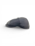 Modello Dublino in vera pelle nappa waterproof nera e fascetta e visiera in lana shetland grigio