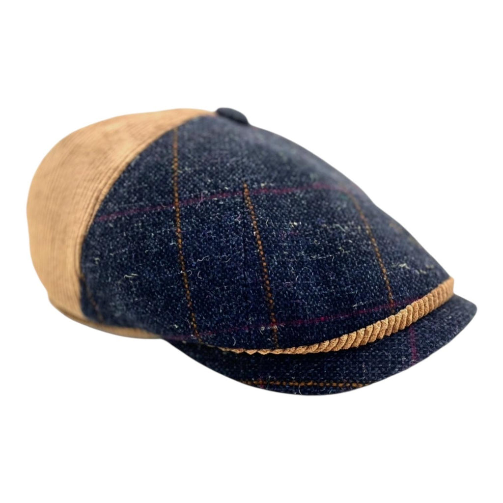 Modello Belfast otto pezzi in tessuto shetland blu e velluto abbinato in una combinazione esclusiva. Ottopezzi con fascetta