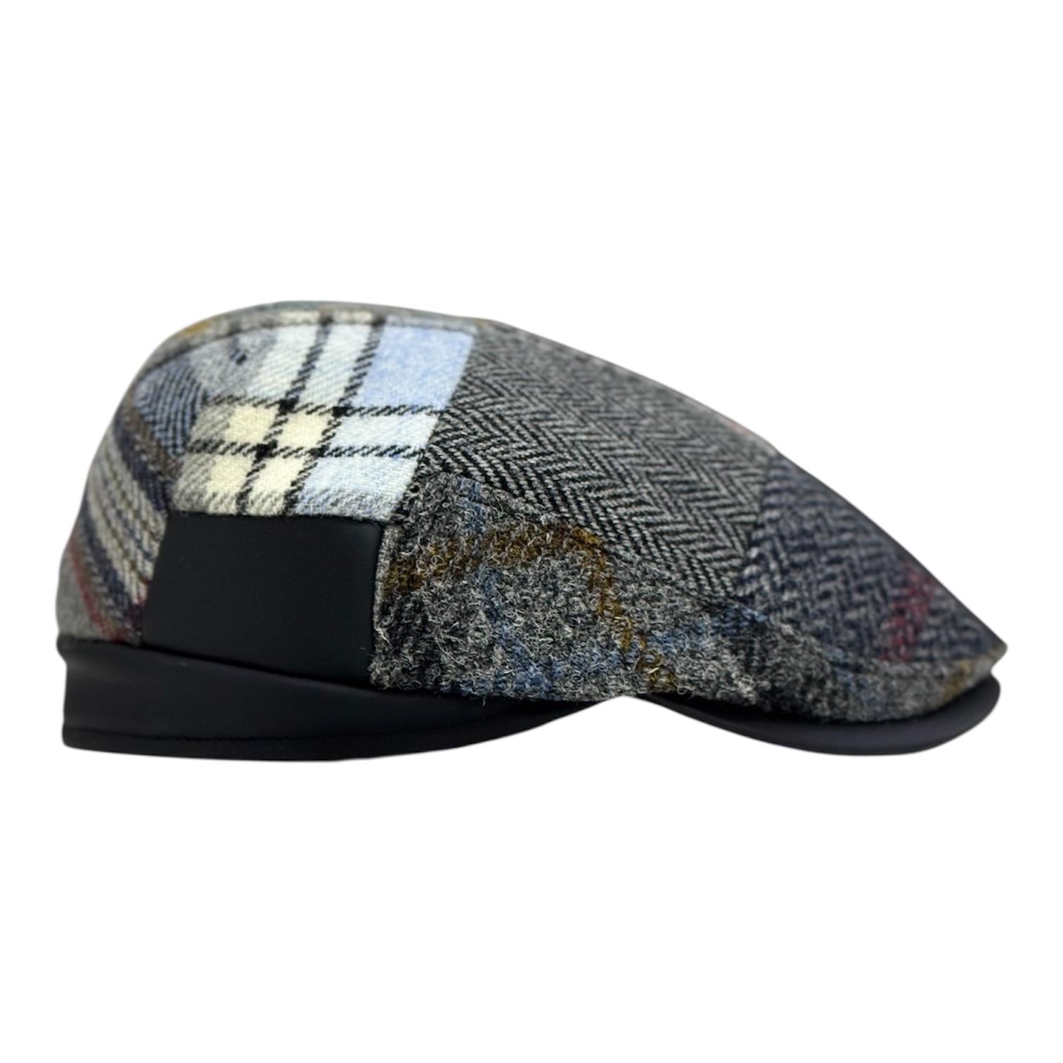 Modello London Conte in tessuto shetland patchwork con fascetta e visiera in vera pelle nappa